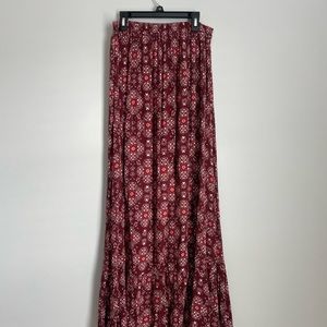 Earthbound bohemian maxi skirt with opening in front below knee. Button detail